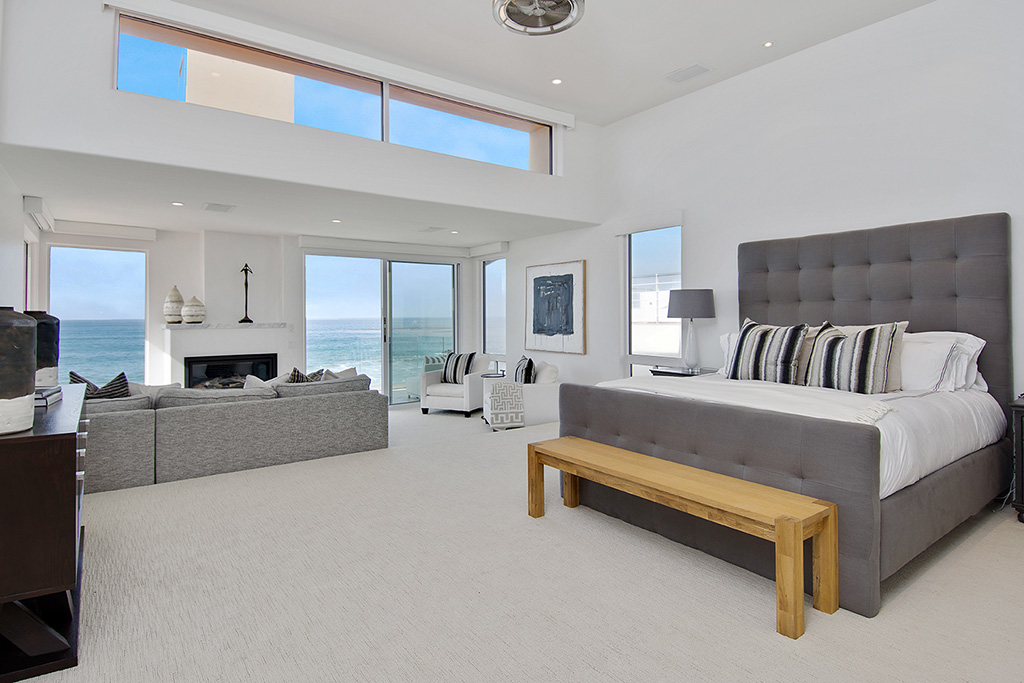 Beach House Treatment Malibu white house master bedroom with ocean view.